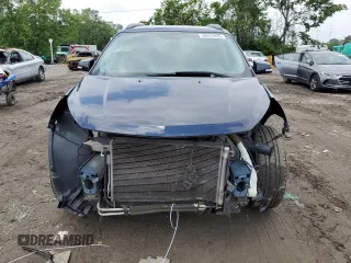 2015 Chevrolet Traverse LT with VIN 1GNKRGKD3FJ156082, listed as a Copart auction lot 56912825 with 123,875 mi miles and Salvage title. Bid and sale history available at DreamBid. Image 5.