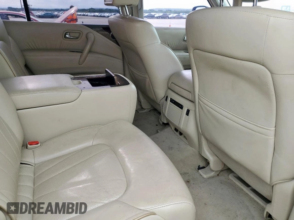 2014 Infiniti QX80 z VIN JN8AZ2NFXE9554446, wystawiony jako Copart lot #59659885 z przebiegiem 240 055 mil mil oraz Czysty tytuł • Clean title. Historia ofert i sprzedaży dostępna na DreamBid. Obrazek 11.