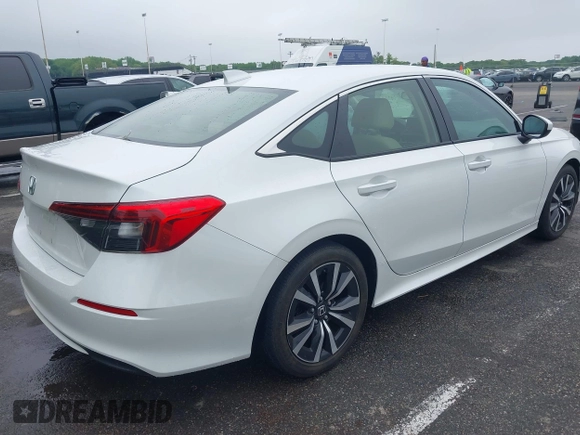 2022 Honda Civic EX with VIN JHMFE1F75NX009666, listed as a IAAI auction lot 42274513 with 25,290 mi miles and . Bid and sale history available at DreamBid. Image 4.