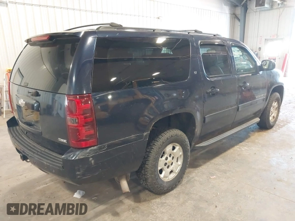 2009 Chevrolet Suburban LT w/1LT with VIN 1GNFK26319R272557, listed as a IAAI auction lot 42138238 with 223,599 mi miles. Bid and sale history available at carsss.com. Image 4.