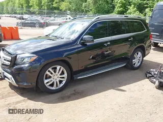 2017 Mercedes-Benz GLS 450 with VIN 4JGDF6EE0HA760910, listed as a IAAI auction lot 42210919 with 140,971 mi miles and . Bid and sale history available at DreamBid. Image 2.