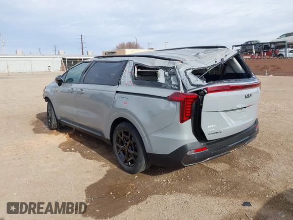 2025 Kia Carnival SX with VIN KNDNE5K33S6497315, listed as a IAAI auction lot 41133179 with 3,063 mi miles and . Bid and sale history available at DreamBid. Image 3.
