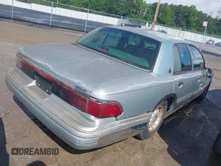 1995 Mercury Grand Marquis LS z VIN 2MELM75W7SX658960, wystawiony jako IAAI lot #42229786 z przebiegiem 205 236 mil mil oraz . Historia ofert i sprzedaży dostępna na DreamBid. Obrazek 4.
