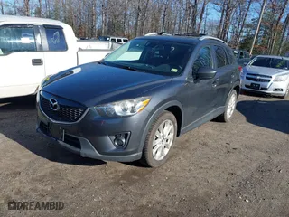 2014 Mazda CX-5 Grand Touring with VIN JM3KE2DY2E0333787, listed as a IAAI auction lot 41861328 with 145,892 mi miles. Bid and sale history available at carsss.com. Image 17.