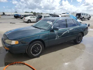 1996 Toyota Camry LE z VIN 4T1BF12K4TU870788, wystawiony jako Copart lot #75050564 z przebiegiem 245 619 mil mil oraz Nie do naprawy • Non repairable. Historia ofert i sprzedaży dostępna na DreamBid. Obrazek 1.