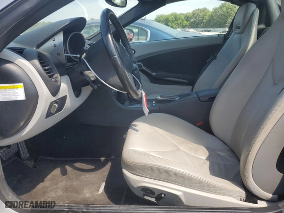 2009 Mercedes-Benz SLK-Class 3.5L with VIN WDBWK58F79F191533, listed as a Copart auction lot 68678724 with 70,418 mi miles and Salvage Title. Bid and sale history available at carsss.com. Image 7.