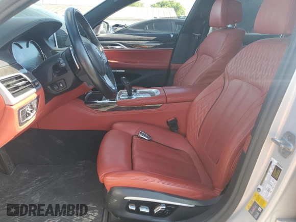 2017 BMW 7 Series 740e xDrive iPerformance with VIN WBA7J2C3XHG497958, listed as a Copart auction lot 58203604 with 75,256 mi miles and Salvage Title. Bid and sale history available at carsss.com. Image 7.