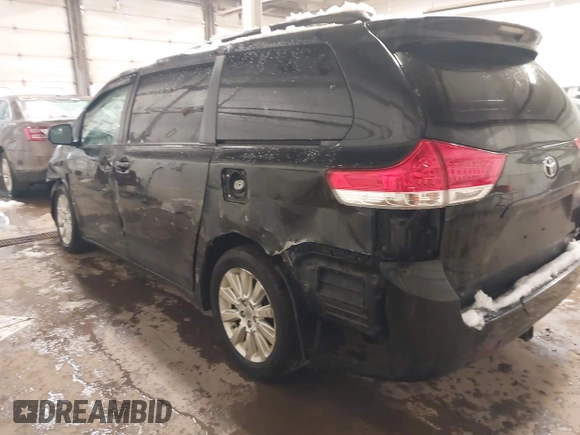 2012 Toyota Sienna LE with VIN 5TDJK3DC1CS036110, listed as a IAAI auction lot 41943807 with 255,111 mi miles. Bid and sale history available at carsss.com. Image 3.