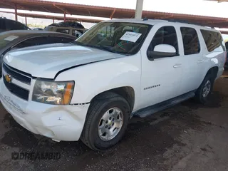 2012 Chevrolet Suburban LT with VIN 1GNSKJE70CR295137, listed as a IAAI auction lot 42112072 with 291,912 mi miles and . Bid and sale history available at DreamBid. Image 2.