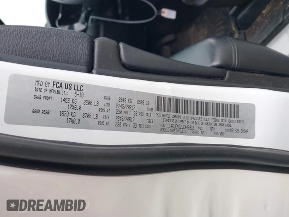 2018 Jeep Grand Cherokee Laredo E with VIN 1C4RJEAG2JC402812, listed as a IAAI auction lot 41439871 with 114,535 mi miles. Bid and sale history available at carsss.com. Image 9.
