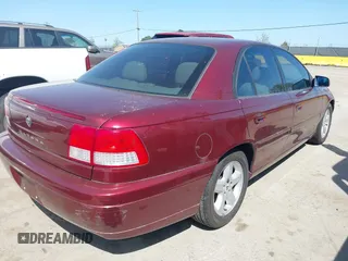 2001 Cadillac Catera z VIN W06VR54R01R003061, wystawiony jako IAAI lot #41989882 z przebiegiem 77 248 mil mil oraz . Historia ofert i sprzedaży dostępna na DreamBid. Obrazek 4.