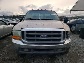 1999 Ford Super Duty F-250 XL with VIN 1FTNX20S2XEA58333, listed as a Copart auction lot 66022572 with 290,286 mi miles and Salvage Title. Bid and sale history available at carsss.com. Image 5.