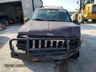 1997 Jeep Grand Cherokee Laredo with VIN 1J4GZ58S5VC688455, listed as a Copart auction lot 74294204 with 135,143 mi miles and Salvage Title. Bid and sale history available at carsss.com. Image 5.