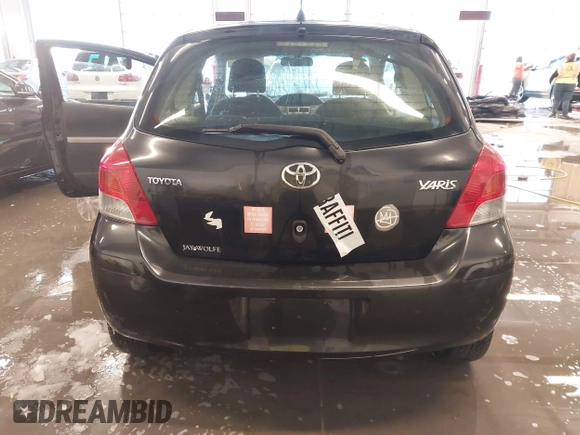 2011 Toyota Yaris with VIN JTDJT4K3XB5327229, listed as a IAAI auction lot 41275717 with 140,276 mi miles. Bid and sale history available at carsss.com. Image 16.