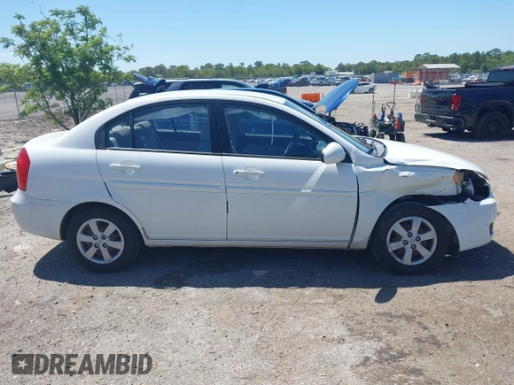 2009 Hyundai Accent Auto GLS with VIN KMHCN46C29U331834, listed as a IAAI auction lot 42027159 with 68,527 mi miles. Bid and sale history available at carsss.com. Image 13.