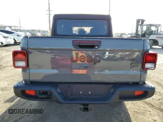 2023 Jeep Gladiator Willys z VIN 1C6HJTAG0PL561098, wystawiony jako Copart lot #51646485 z przebiegiem 20 554 mil mil oraz Szkoda całkowita • Salvage title. Historia ofert i sprzedaży dostępna na DreamBid. Obrazek 6.