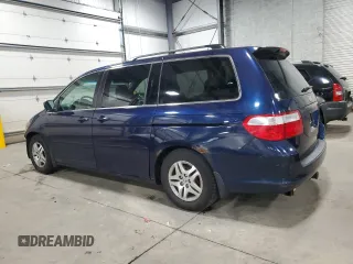 2005 Honda Odyssey EX-L with VIN 5FNRL38625B024415, listed as a Copart auction lot 52380955 with 182,660 mi miles and Salvage Title. Bid and sale history available at carsss.com. Image 2.