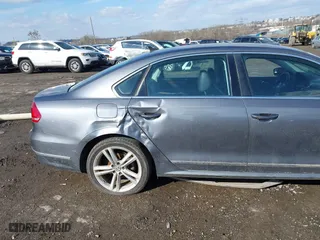 2013 Volkswagen Passat SEL Premium with VIN 1VWCM7A32DC063184, listed as a IAAI auction lot 41505096 with 121,482 mi miles. Bid and sale history available at carsss.com. Image 6.