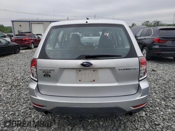 2009 Subaru Forester X with VIN JF2SH61649H778759, listed as a Copart auction lot 59593105 with 57,320 mi miles and Clean title. Bid and sale history available at DreamBid. Image 6.