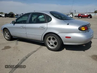 1996 Ford Taurus GL with VIN 1FALP52U7TA299996, listed as a Copart auction lot 53387685 with 175,029 mi miles and Salvage title. Bid and sale history available at DreamBid. Image 2.