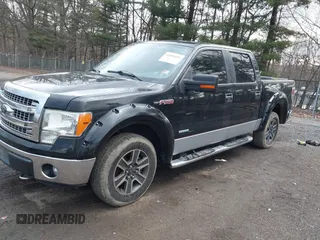2013 Ford F-150 XL with VIN 1FTFW1ET1DFA13392, listed as a IAAI auction lot 41834459 with 153,797 mi miles and . Bid and sale history available at carsss.com. Image 2.