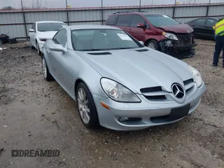 2005 Mercedes-Benz SLK-Class with VIN WDBWK56FX5F075529, listed as a IAAI auction lot 41535391 with 104,792 mi miles. Bid and sale history available at carsss.com. Image 1.