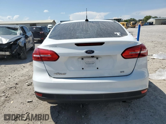 2017 Ford Focus SE with VIN 1FADP3F21HL255540, listed as a Copart auction lot 55151245 with 112,161 mi miles and Salvage Title. Bid and sale history available at DreamBid. Image 6.