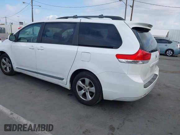 2013 Toyota Sienna LE AAS with VIN 5TDKK3DC2DS302465, listed as a IAAI auction lot 42241744 with 149,937 mi miles and . Bid and sale history available at DreamBid. Image 3.