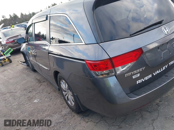 2014 Honda Odyssey EX-L with VIN 5FNRL5H67EB073640, listed as a IAAI auction lot 41115124 with 99,841 mi miles and . Bid and sale history available at carsss.com. Image 3.