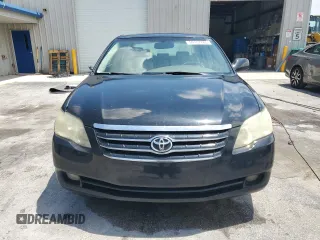 2005 Toyota Avalon XL z VIN 4T1BK36B05U022928, wystawiony jako Copart lot #59137785 z przebiegiem 146 854 mil mil oraz Szkoda całkowita • Salvage title. Historia ofert i sprzedaży dostępna na DreamBid. Obrazek 5.