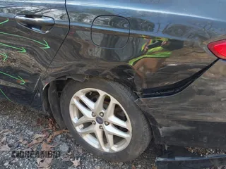 2013 Ford Fusion SE with VIN 3FA6P0HR8DR173558, listed as a IAAI auction lot 42096177 with 71,977 mi miles and . Bid and sale history available at DreamBid. Image 14.