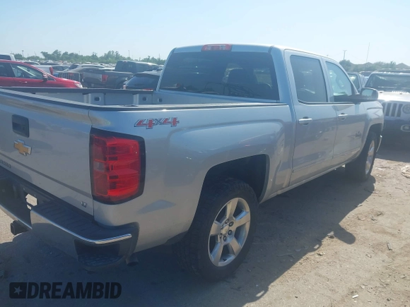 2015 Chevrolet Silverado 1500 LT with VIN 3GCUKREC7FG343346, listed as a IAAI auction lot 41972214 with 256,067 mi miles and . Bid and sale history available at DreamBid. Image 4.