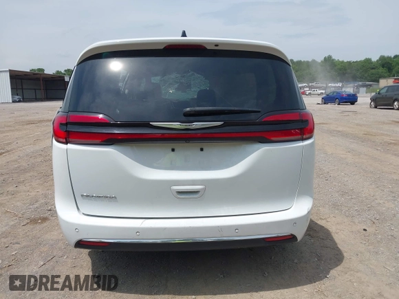 2023 Chrysler Pacifica Touring L with VIN 2C4RC1BGXPR531396, listed as a IAAI auction lot 42492340 with Not provided miles and . Bid and sale history available at DreamBid. Image 16.