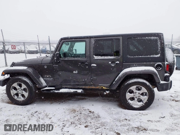 2017 Jeep Wrangler Unlimited Sahara with VIN 1C4BJWEG4HL591149, listed as a IAAI auction lot 41542157 with 70,630 mi miles. Bid and sale history available at carsss.com. Image 14.
