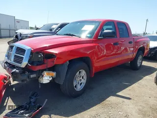 2006 Dodge Dakota SLT z VIN 1D7HE48NX6S588584, wystawiony jako IAAI lot #42348429 z przebiegiem 246 965 mil mil oraz . Historia ofert i sprzedaży dostępna na DreamBid. Obrazek 15.