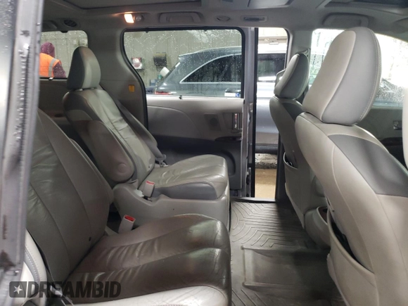 2011 Toyota Sienna XLE AAS with VIN 5TDYK3DC0BS174864, listed as a Copart auction lot 50387005 with 218,938 mi miles and Salvage Title. Bid and sale history available at DreamBid. Image 11.