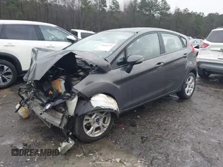 2016 Ford Fiesta SE with VIN 3FADP4EJ7GM166857, listed as a IAAI auction lot 38602273 with Not Provided miles and . Bid and sale history available at carsss.com. Image 2.