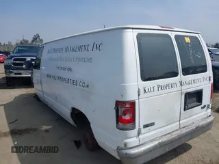 1999 Ford Econoline Cargo with VIN 1FTRE1421XHA35992, listed as a IAAI auction lot 42008448 with 293,689 mi miles and . Bid and sale history available at carsss.com. Image 3.