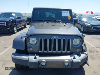 2018 Jeep Wrangler JK Unlimited Altitude with VIN 1C4BJWEG9JL802853, listed as a IAAI auction lot 41993420 with 51,742 mi miles. Bid and sale history available at carsss.com. Image 12.