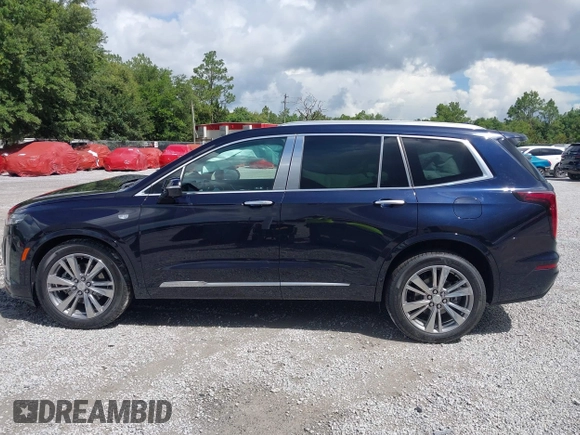 2022 Cadillac XT6 Premium Luxury with VIN 1GYKPCRS4NZ145145, listed as a IAAI auction lot 42533642 with 36,450 mi miles and . Bid and sale history available at DreamBid. Image 14.