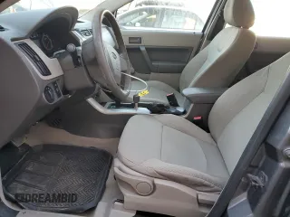 2009 Ford Focus S with VIN 1FAHP34N79W212190, listed as a Copart auction lot 44628945 with 129,568 mi miles and Salvage Title. Bid and sale history available at carsss.com. Image 7.