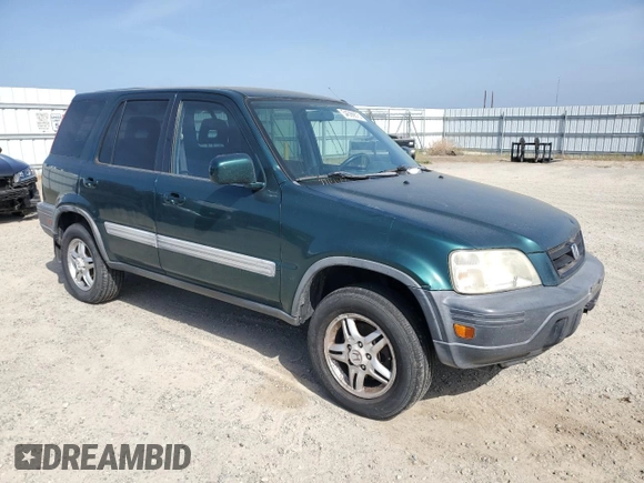 1999 Honda CR-V EX with VIN JHLRD1867XC013995, listed as a Copart auction lot 54599875 with 292,302 mi miles and Clean Title. Bid and sale history available at carsss.com. Image 4.