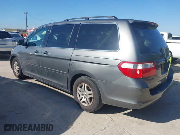 2007 Honda Odyssey EX-L z VIN 5FNRL38787B080046, wystawiony jako IAAI lot #42240227 z przebiegiem 138 073 mil mil oraz . Historia ofert i sprzedaży dostępna na DreamBid. Obrazek 3.