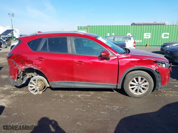 2016 Mazda CX-5 Touring with VIN JM3KE4CY0G0901356, listed as a IAAI auction lot 41641742 with 96,950 mi miles. Bid and sale history available at carsss.com. Image 13.