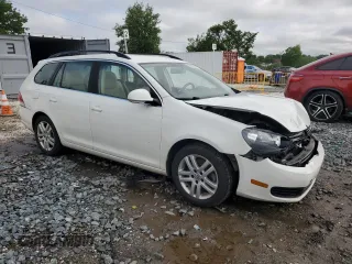 2013 Volkswagen Jetta TDI w/Sunroof & Nav with VIN 3VWPL7AJ1DM632379, listed as a Copart auction lot 58860355 with 123,327 mi miles and Salvage title. Bid and sale history available at DreamBid. Image 4.