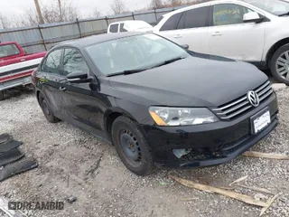 2014 Volkswagen Passat Wolfsburg Ed with VIN 1VWAT7A3XEC081265, listed as a IAAI auction lot 41150782 with 93,467 mi miles. Bid and sale history available at carsss.com. Image 1.