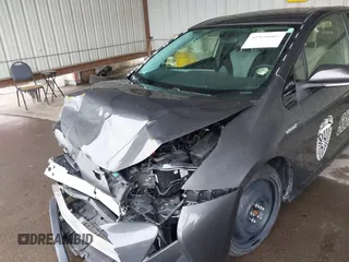 2016 Toyota Prius Two z VIN JTDKBRFU8G3008146, wystawiony jako IAAI lot #41920005 z przebiegiem 116 613 mil mil oraz . Historia ofert i sprzedaży dostępna na DreamBid. Obrazek 19.