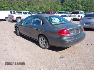 2005 Ford Taurus SE with VIN 1FAFP532X5A272398, listed as a IAAI auction lot 42001798 with 159,199 mi miles. Bid and sale history available at carsss.com. Image 3.