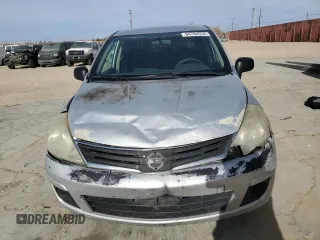 2010 Nissan Versa 1.6 with VIN 3N1CC1AP4AL372566, listed as a Copart auction lot 84704534 with 333,475 mi miles and Salvage Title. Bid and sale history available at carsss.com. Image 5.