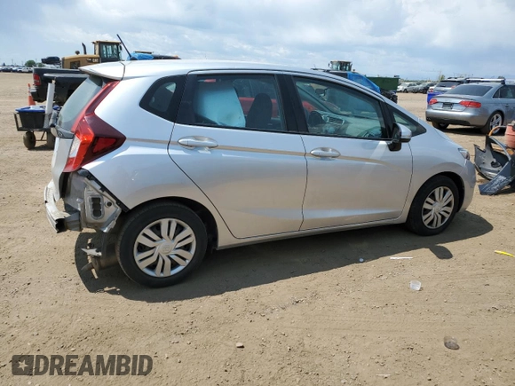2015 Honda Fit LX with VIN 3HGGK5H59FM709104, listed as a Copart auction lot 63569065 with 101,859 mi miles and Salvage title. Bid and sale history available at DreamBid. Image 3.